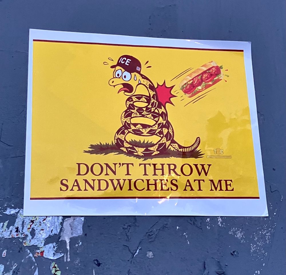 Sticker with a snake with an ice hat being hit with a sandwich saying: don’t throw sandwiches at me 