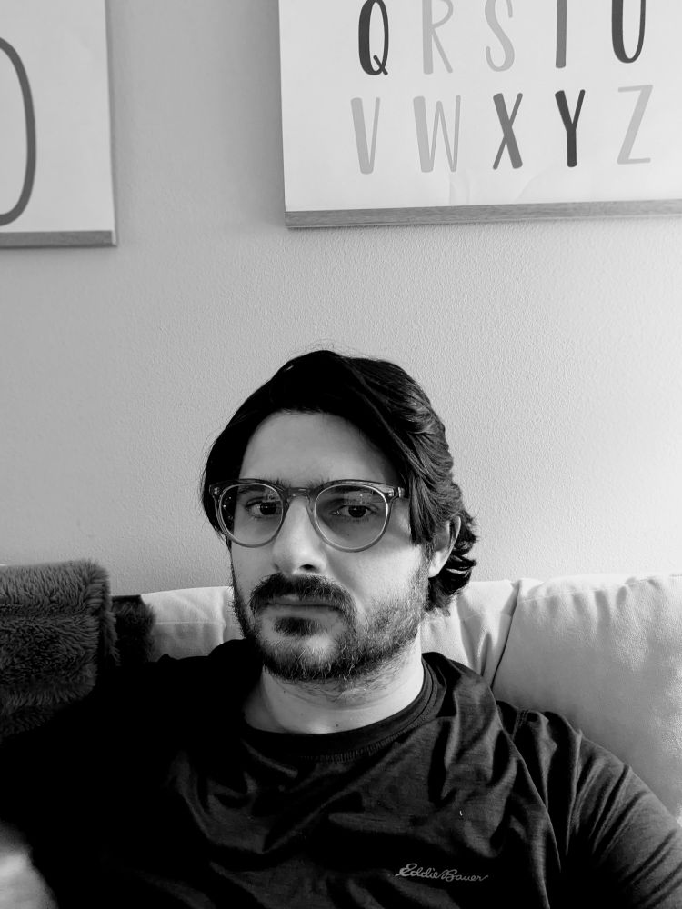 Black and white photo of me with longer hair. 