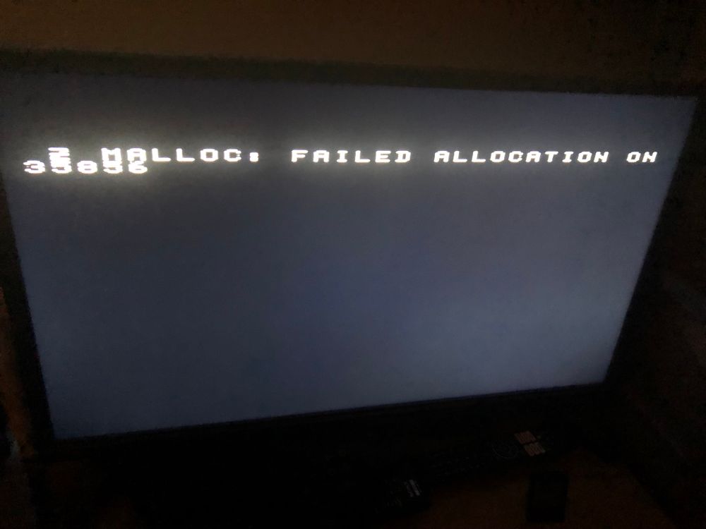 A black screen with white lettering that reads, “2 MALLOC: FAILED ALLOCATION ON 35856”. A screen I had never seen before!