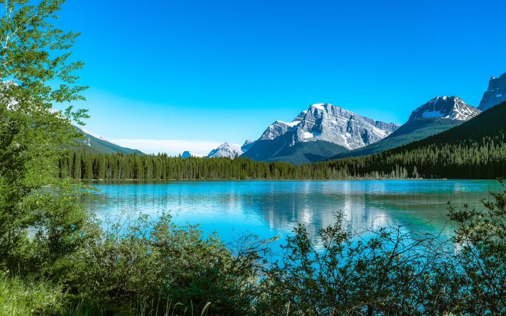 Lake, forest, mountains, landscape, blue sky.
