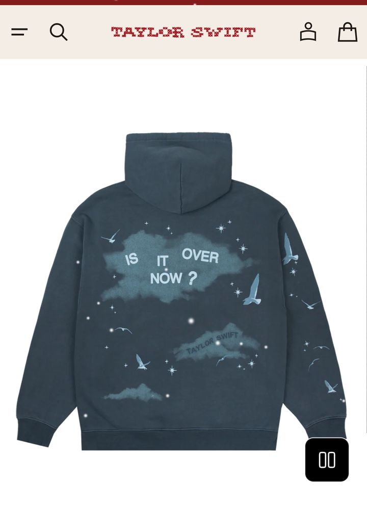 Screenshot of a dark blue hoodie from Taylor Swift's merch website. It was a pattern in the back that combines sparkling stars, Flying birds, And the words "Is it over now?" Towards the top