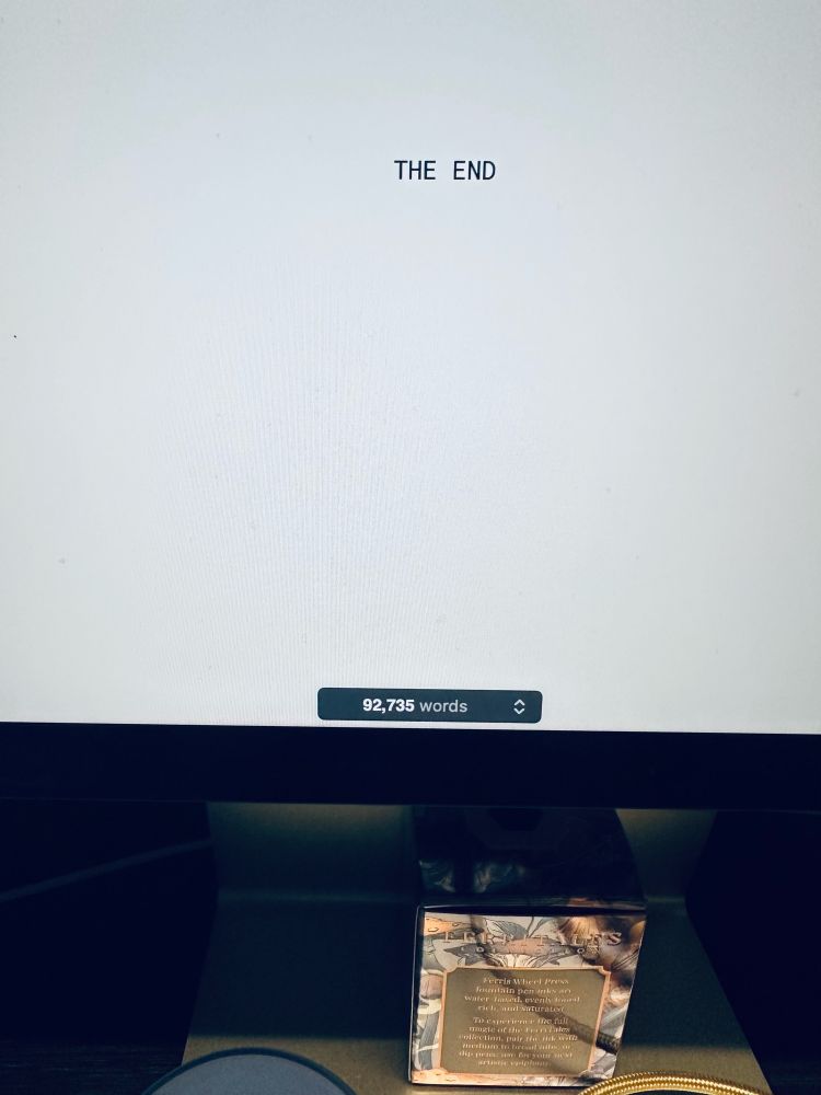 A word document that says THE END at 92,735 words