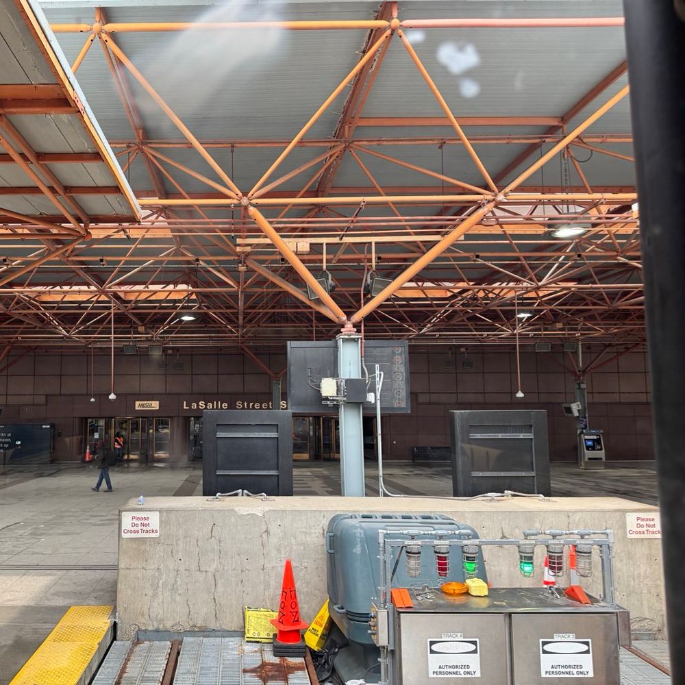 photo from the front facing window of the gallery car of the rock island district pulling into lasalle st station. the station is mostly empty because it was a sunday afternoon.