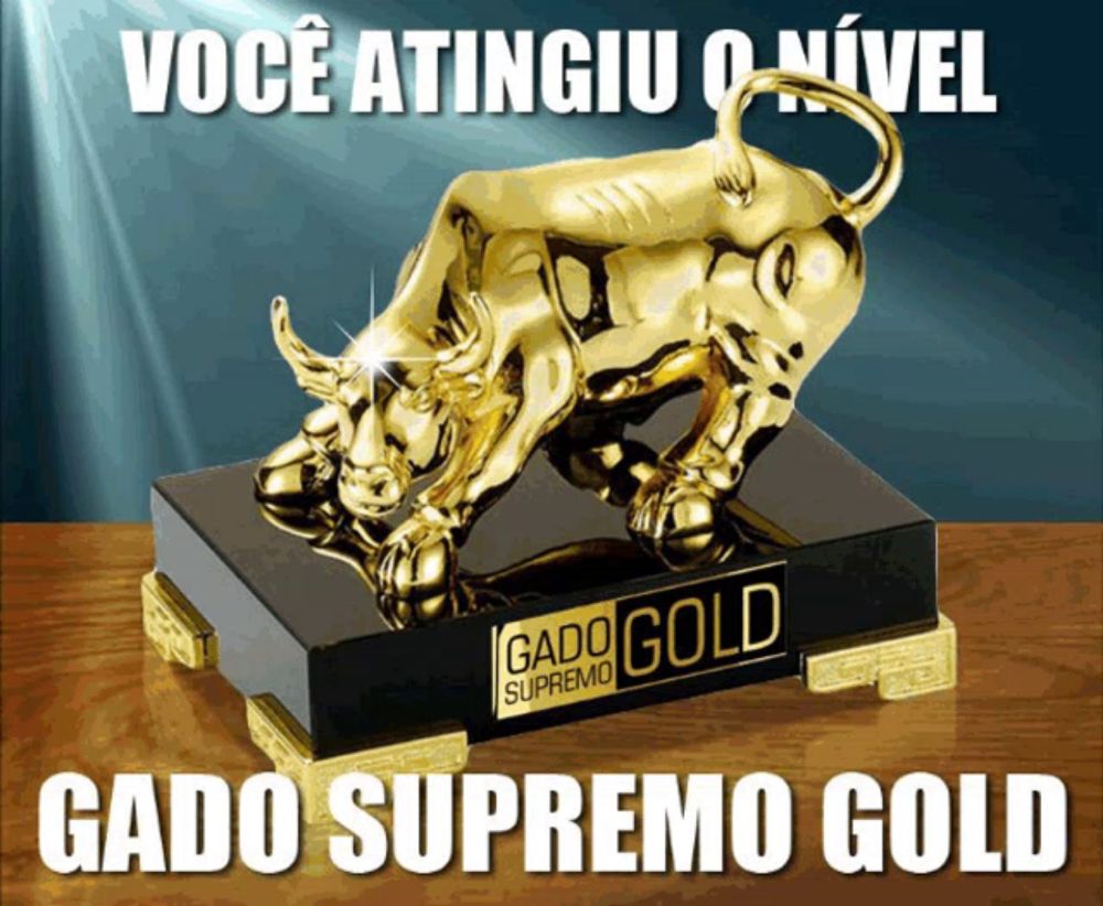 a statue of a bull with the words gado supremo gold below it