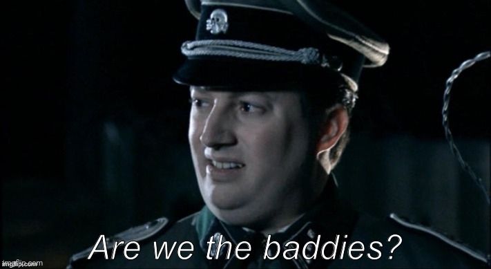 Mann in SS Uniform guckt fragend. Darunter Text: "Are we the baddies?"