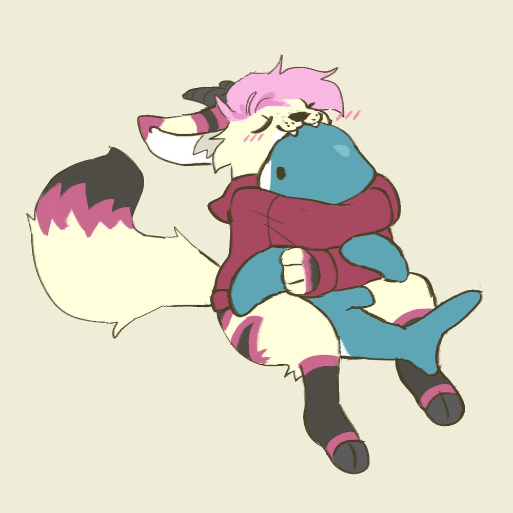 Gyoju cuddling his blahaj