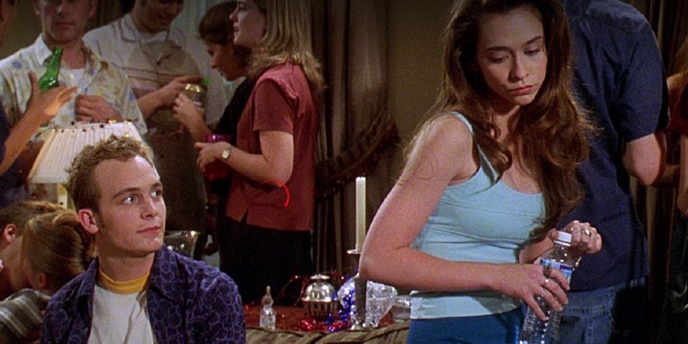 Ethan Embry as Preston staring at Jennifer Love Hewitt as Amanda in CAN'T HARDLY WAIT.