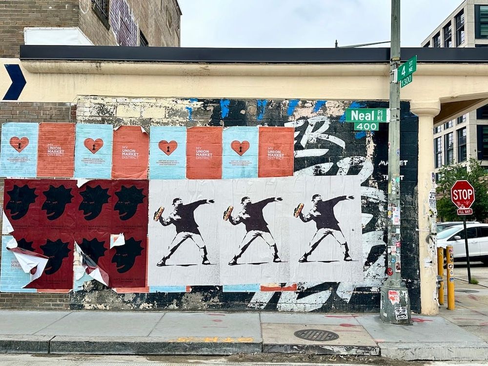 Today:

Sean Dunn, who will forever be known as Sandwich Guy, was found not guilty of misdemeanor assault by a jury in federal court in DC Thursday.

It was never in doubt that Dunn threw a sandwich at a federal officer at 14th and U streets in August, shouting, “Fuck you! You fucking fascists! Why are you here? I don’t want you in my city!” according to a federal indictment. It’s also undeniable that Dunn’s airborne-footlong protest, video of which went viral, became an unlikely symbol of local resistance to the Trump administration during its crackdown on DC this summer, precisely because of the disconnect between the seriousness of the incident and the government’s response.

Despite Dunn’s offer to surrender, the administration sent armed troops to his apartment and filmed his arrest. The office of US Attorney for DC Jeanine Pirro charged him with felony assault;he lost his job as a paralegal at the Department of Justice, with US Attorney General Pam Bondi calling him “an example of the Deep State.” Meanwhile, stylized, Bansky-style images of a man preparing to wing a hoagie appeared all over DC.

Words: 
https://washingtonian.com/2025/11/06/sandwich-guy-not-guilty/