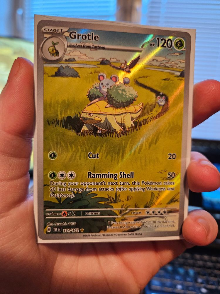 An illustration rare card of Grotle.