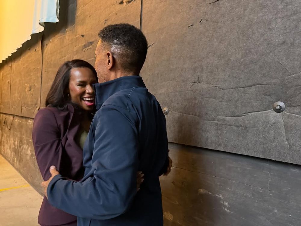 Charles Randolph-Wright on his way to hugging Tamberla Perry.