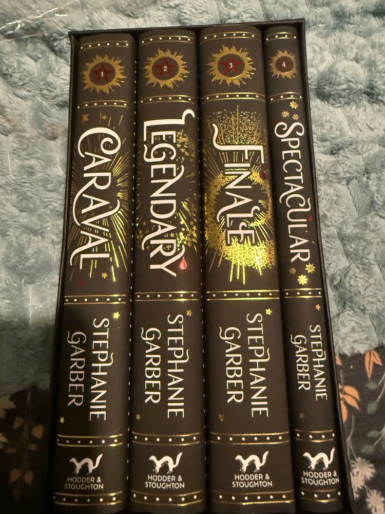 Set of special edition books the Caraval set by Stephanie Garber there are four pictures each showing what the outer of book looks like and just inside. I put up 4 pictures