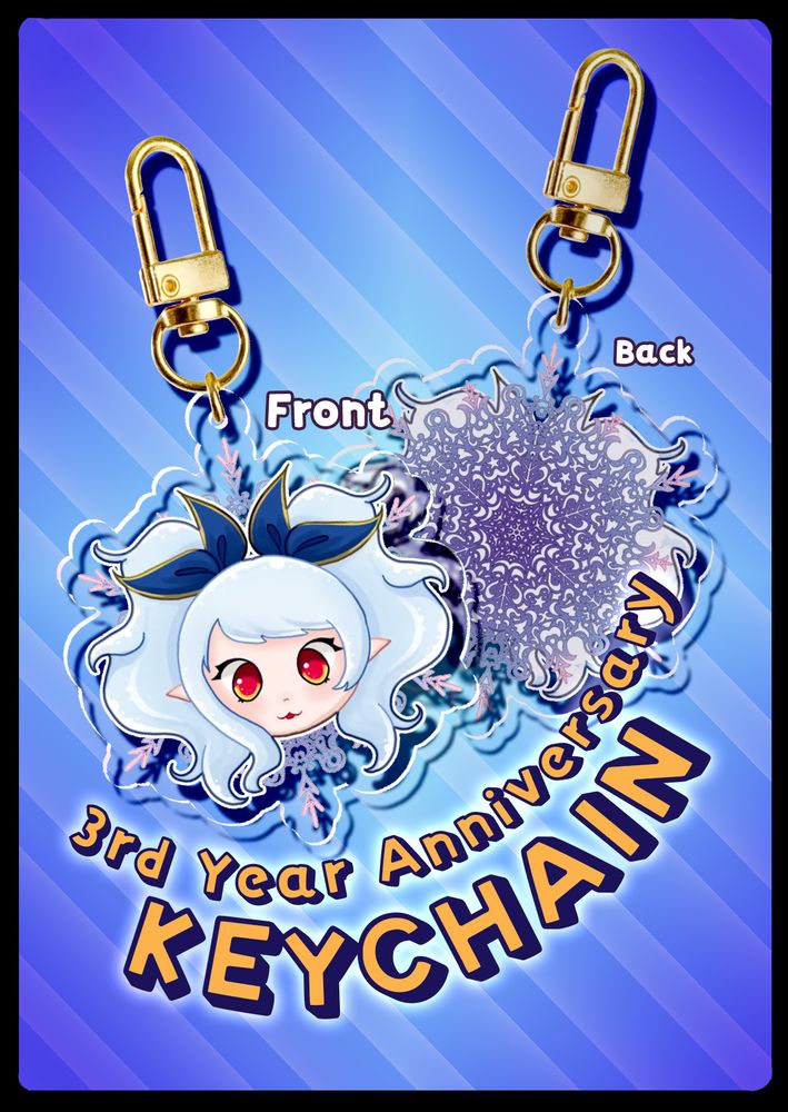 A keychain with on one side a drawing of Aoi's face and on the other side a complex purple and pink snowflake. 
Under is is written: 3rd year anniversary keychain.