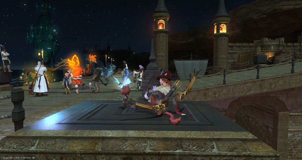 Same as the previous image but the camera is turned to show several other players at the gathering.