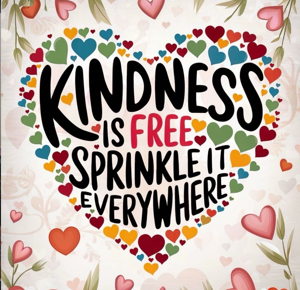 A heart-shaped design made up of multicoloured hearts surrounds the words “Kindness is free, sprinkle it everywhere” on a pale background with leaves and more heart 