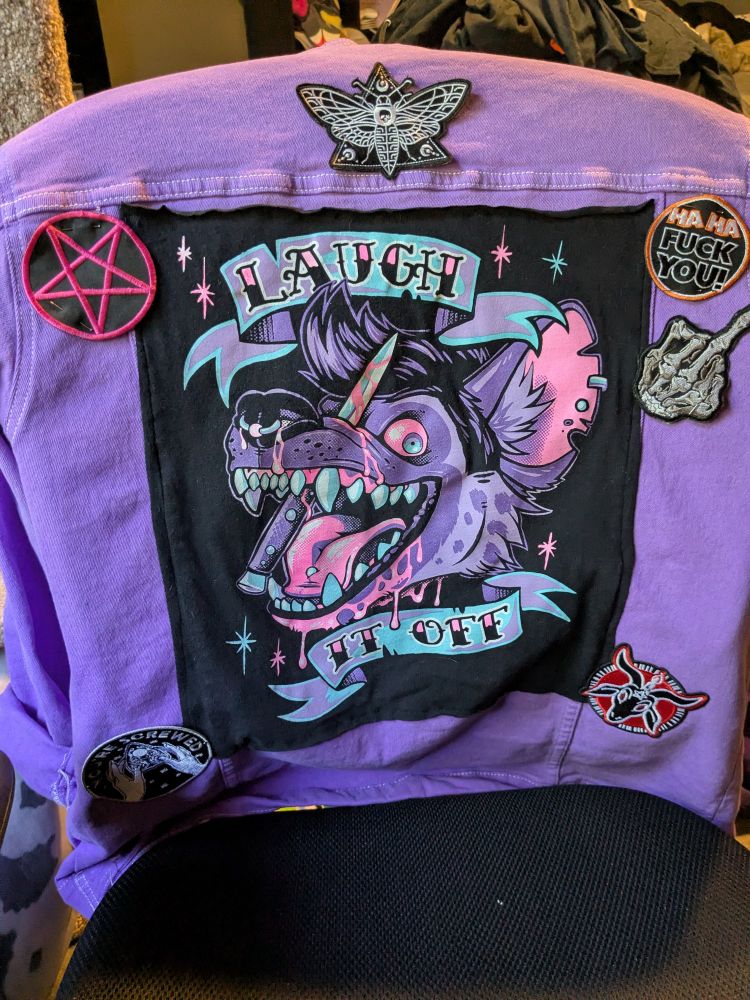 Patches pinned on my new purple jacket! 