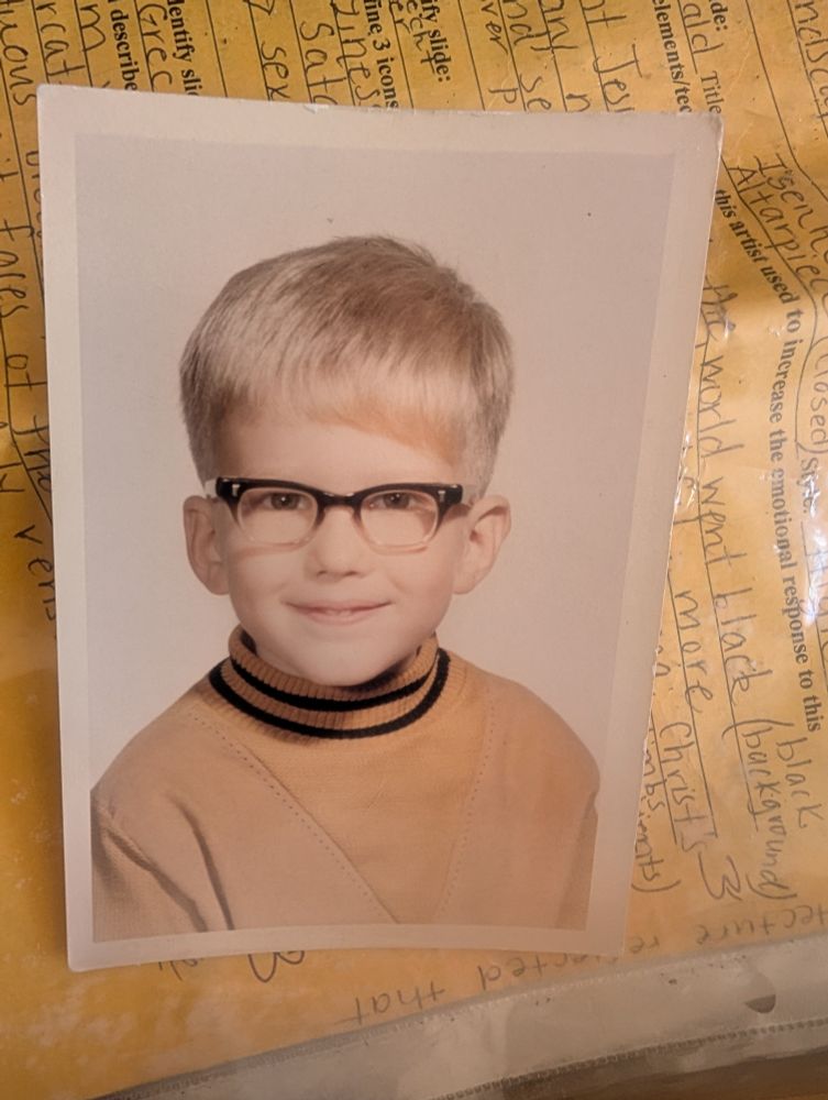 Kid with a bowl on his head