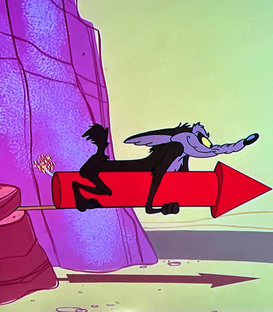 Wile E Coyote riding an ACME rocket