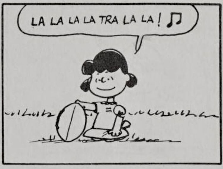 Lucy Van Pelt is holding a football that Charlie Brown will probably miss. From Peanuts strip by Charles Schulz. 