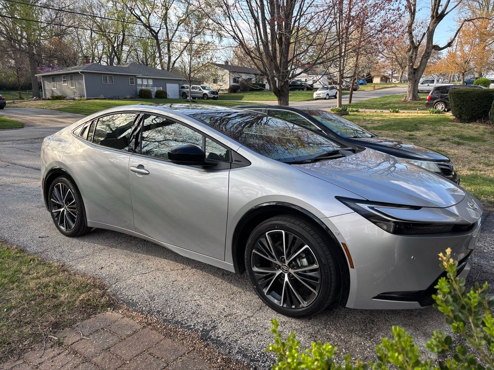 Silver Toyota Prius sits in the driveway looking brand new (because it is!)