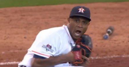 Houston Astros pitcher Al Albuquerque screams in horror as the Royals score again on a ball that bounced past him and was muffed by shortstop Carlos Correa