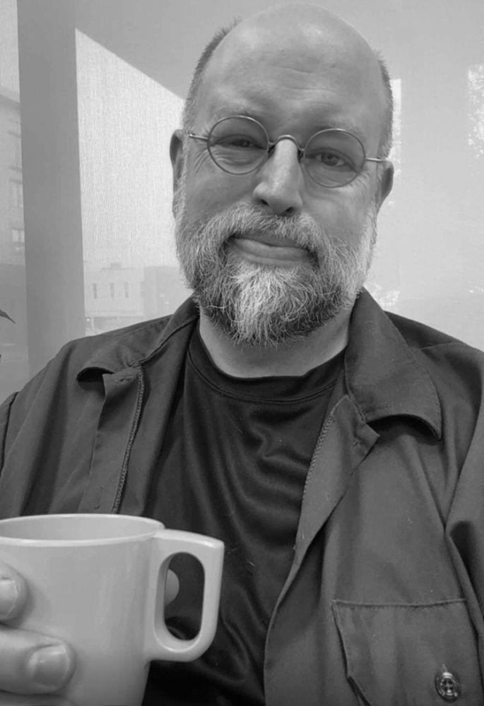 The author, holding a melamine coffee cup.