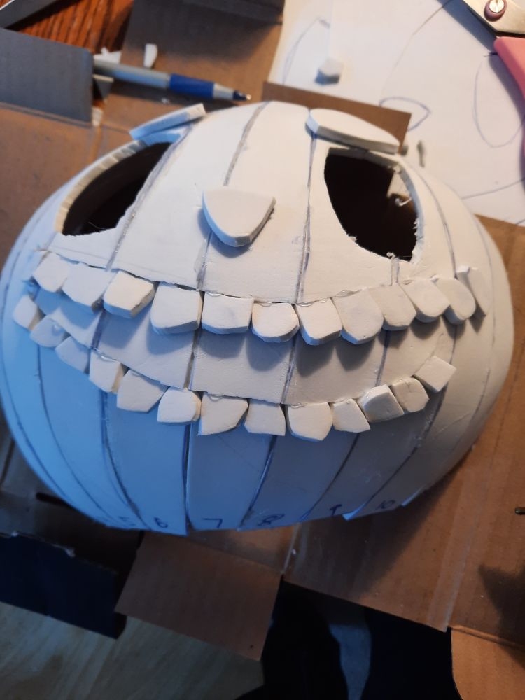 An EVA foam head with rather menacing teeth. 