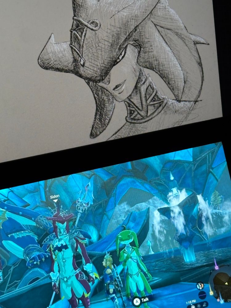 A picture of a switch console leaning against an iPad. On the iPad is a detailed sketch of Sidon from The Legend of Zelda: Tears of the Kingdom. On the switch is the game showing Link standing between Sidon and Yona. He’s staring up at Sidon’s profile- implying that Link is the one who drew the sketch. 