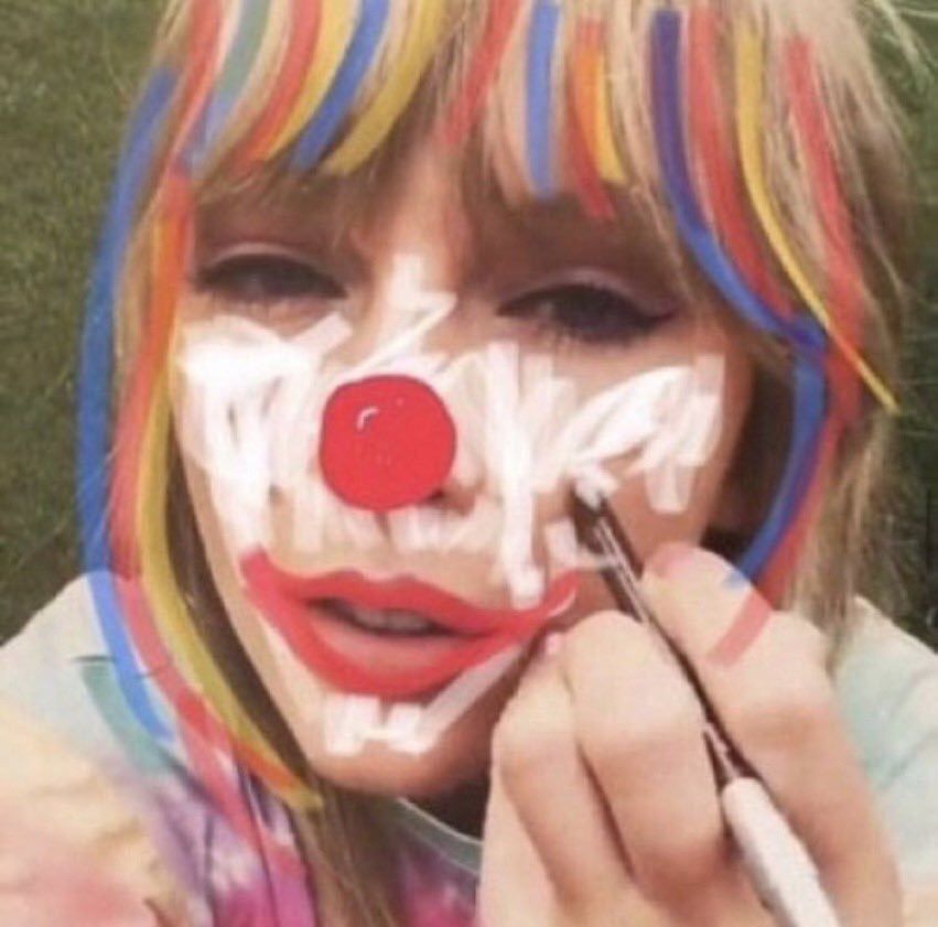 Taylor Swift applying clown makeup but it's from an editing app, implying that I am putting my clown makeup on to clown for reputation