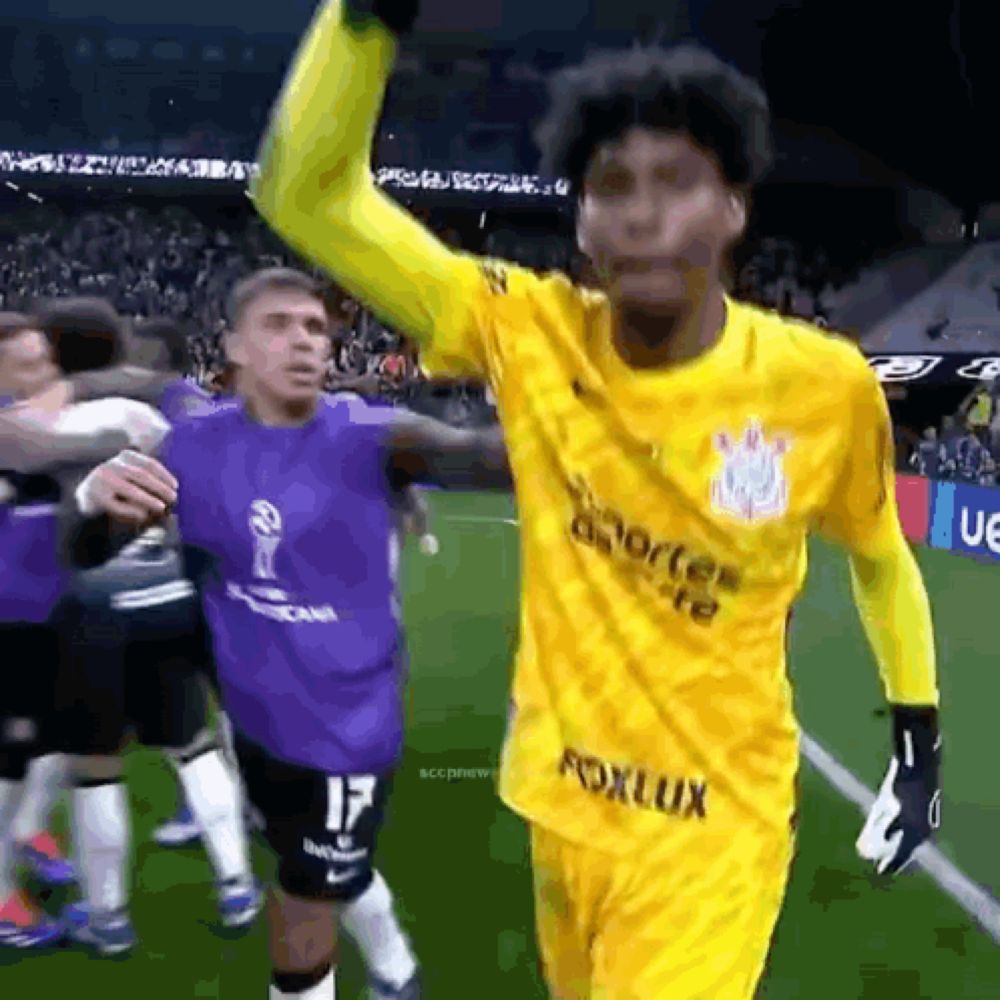 a soccer player wearing a yellow jersey that says fox lux