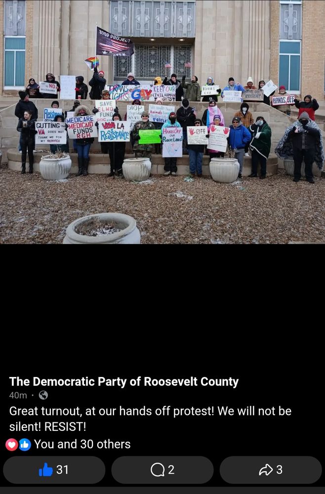 Group pic of HandsOff2025 protestors from Portals, NM, in front of the courthouse. 