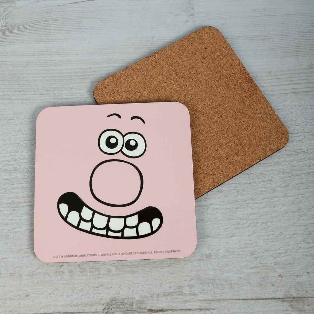 A product image of a coaster bearing an image of Wallace from Wallace and Gromit's face. The coaster is skin coloured and Wallace's face fills it to the edges. 