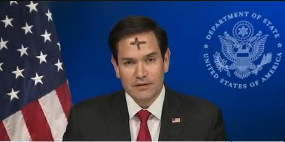 Marco Rubio with a performatively large Ash Wednesday cross on his forehead on TV during an interview.