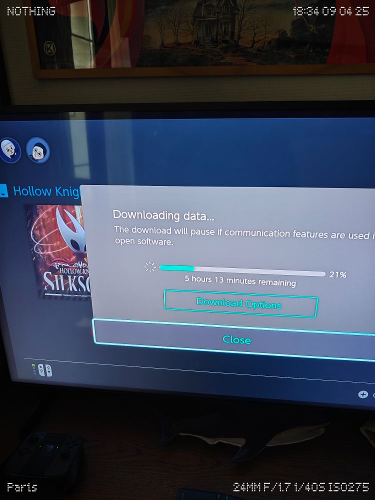 Écran de téléchargement de la Switch qui annonce qu'il me reste 5 heures avant téléchargement complet de Silksong 