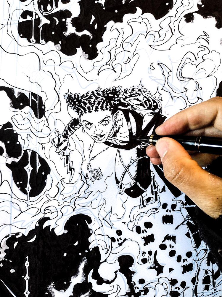 closeup of ink process on the cover for Bytchcraft issue 4. I am using a kuretake brush pen to fill in the blacks on Em, a punky wytch bursting out of flames