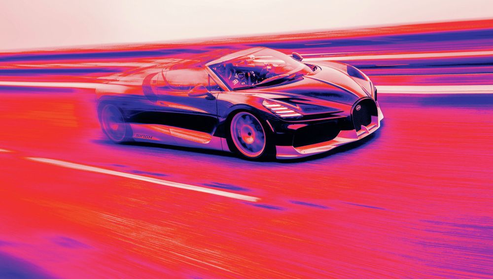 Racing driver Andy Wallace sets a new speed record in a Bugatti Mistral.