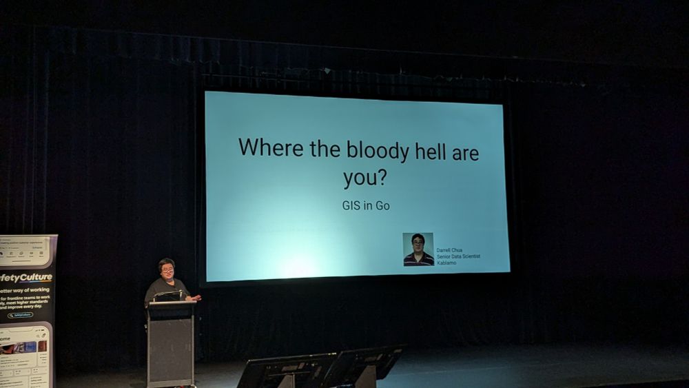 Darrell in front of his title slide