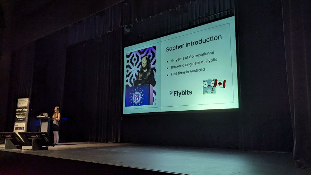 Ellen Gao in front of a slide that introduces herself
