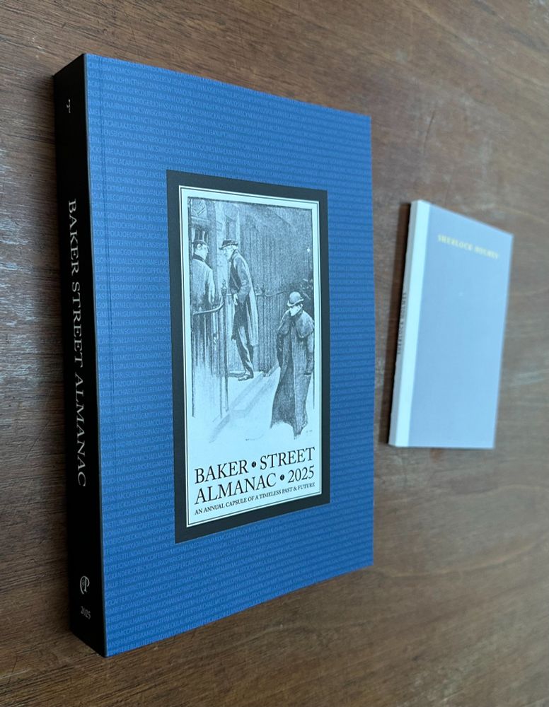 Photo of front cover of 2025 Baker Street Almanac with small "Sherlock Holmes" companion volume.