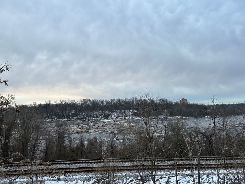 Train tracks running parallel to the James River. Snow still visible despite the warm weather. Big Foot still remains unphotographed.