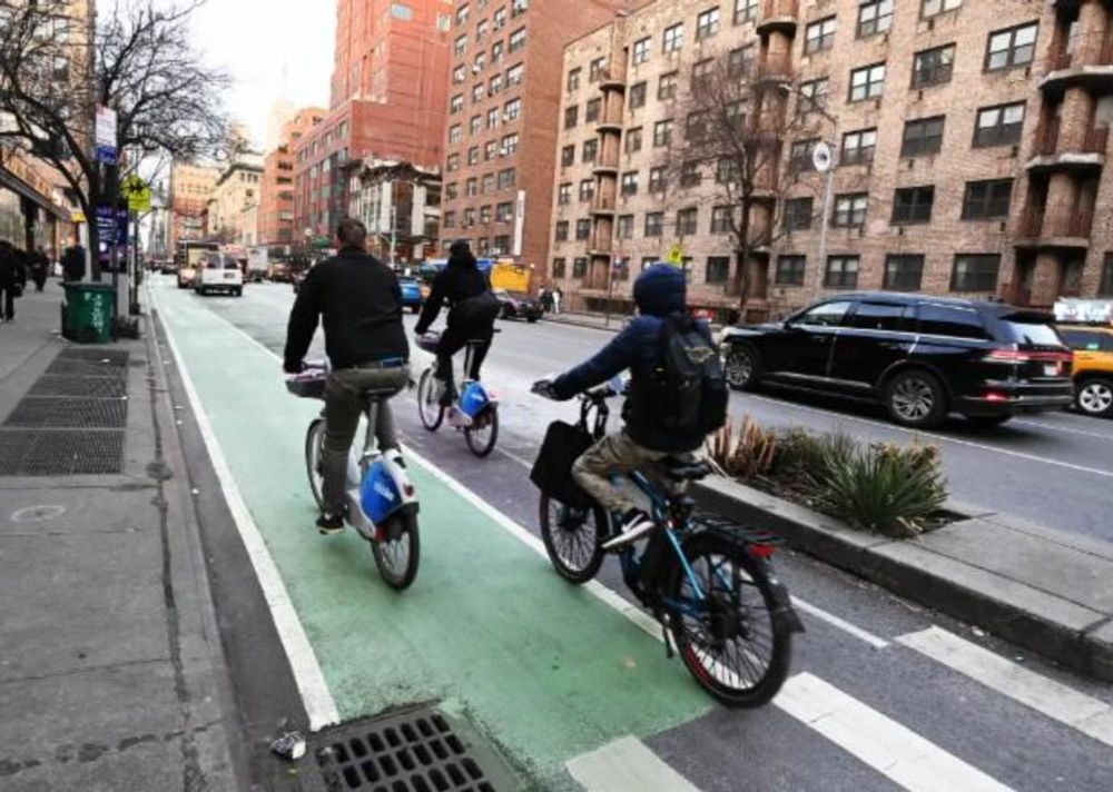 Cyclist sues New York Police Department over "malicious and outrageous" fines for jumping red lights, arguing officers are getting traffic law wrong