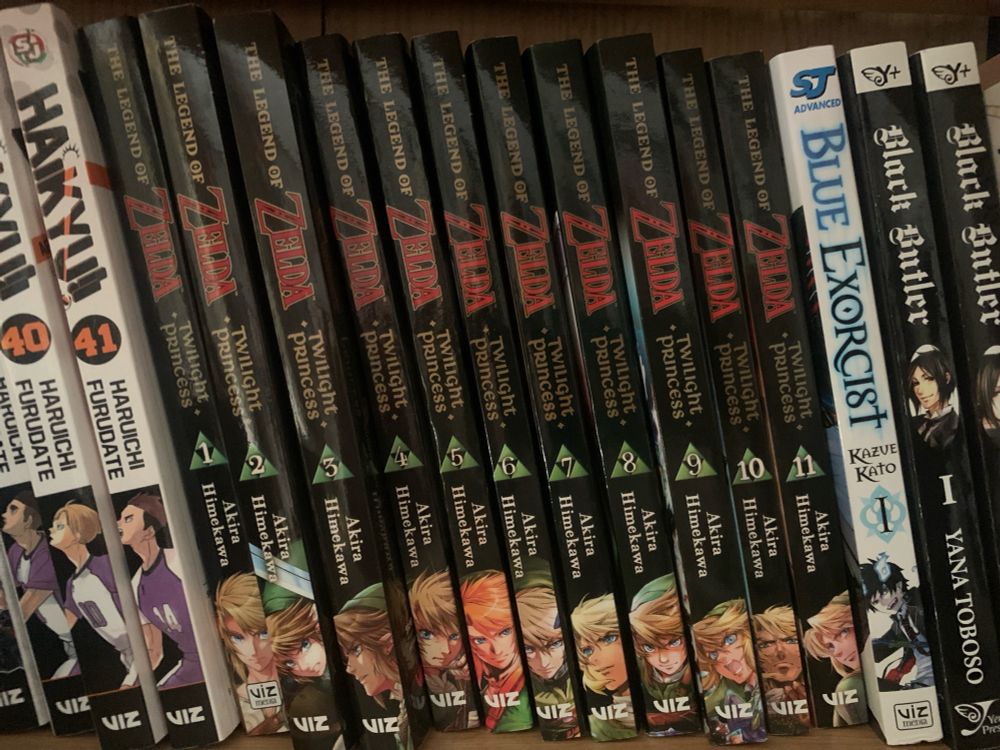 A photo of edition 1 to 11 from the legend of zelda twilight princess manga