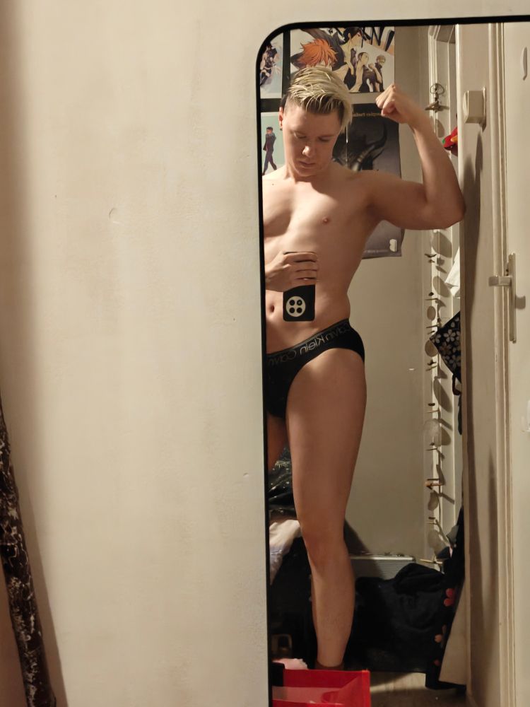 A more ripped twink wearing briefs