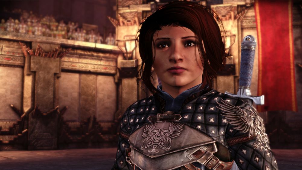 A Dwarf Noble Rogue Warden from Dragon Age: Origins. She's very cute and has brown hair and brown eyes.