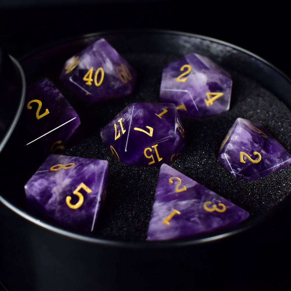Did you know? When amethyst is heated to around 450°C, its color changes to yellow, turning into the hue of ametrine.

"Will prolonged exposure of amethyst dice to high temperatures in sunlight cause that too?"

"Yes but takes long".

No, we haven’t actually tried heating the dice to 450°C.