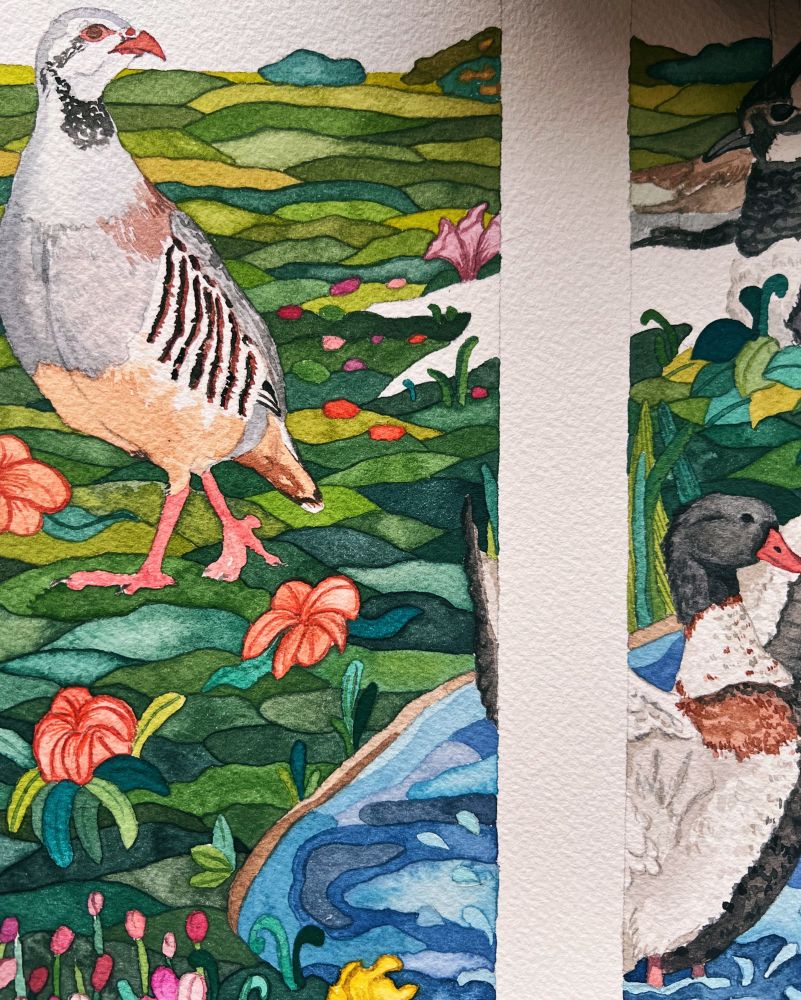 Closeup of a work-in-progress watercolor piece inspired by stained glass and featuring Irish birds 