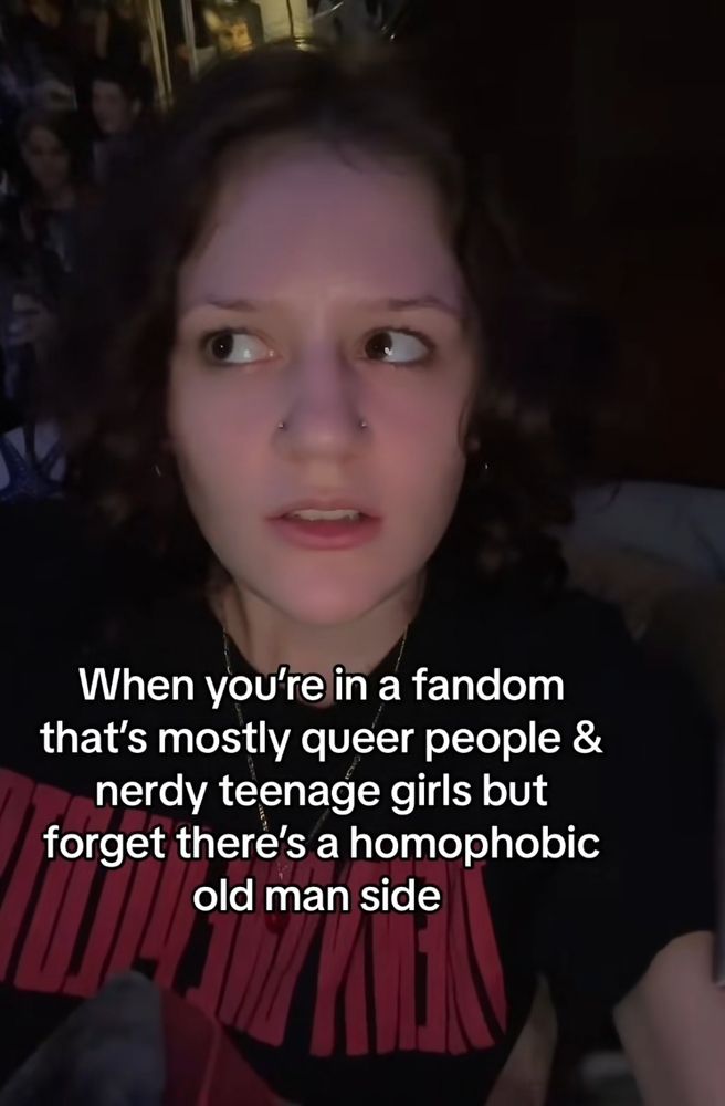 Girl side eyeing with the text "When you're in a fandom that's mostly queer people & nerdy teenage girls but forget there's a homophobic old man side"
