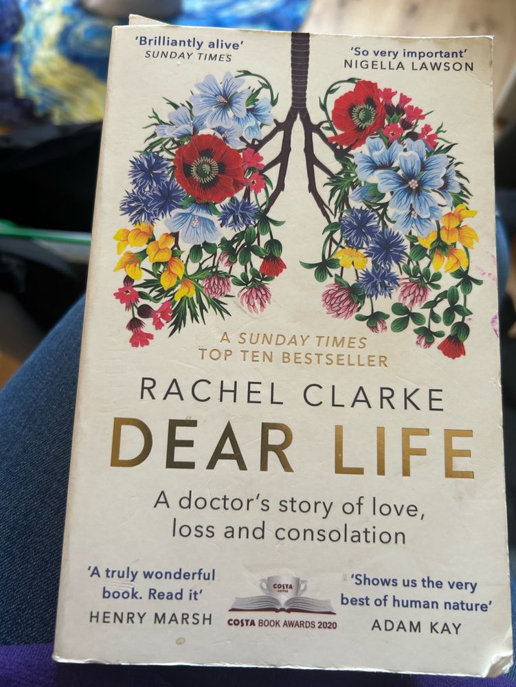 A picture of a (clearly read) paperback copy of Dear Life by Rachel Clarke - a doctor’s story of love, loss and consolation 