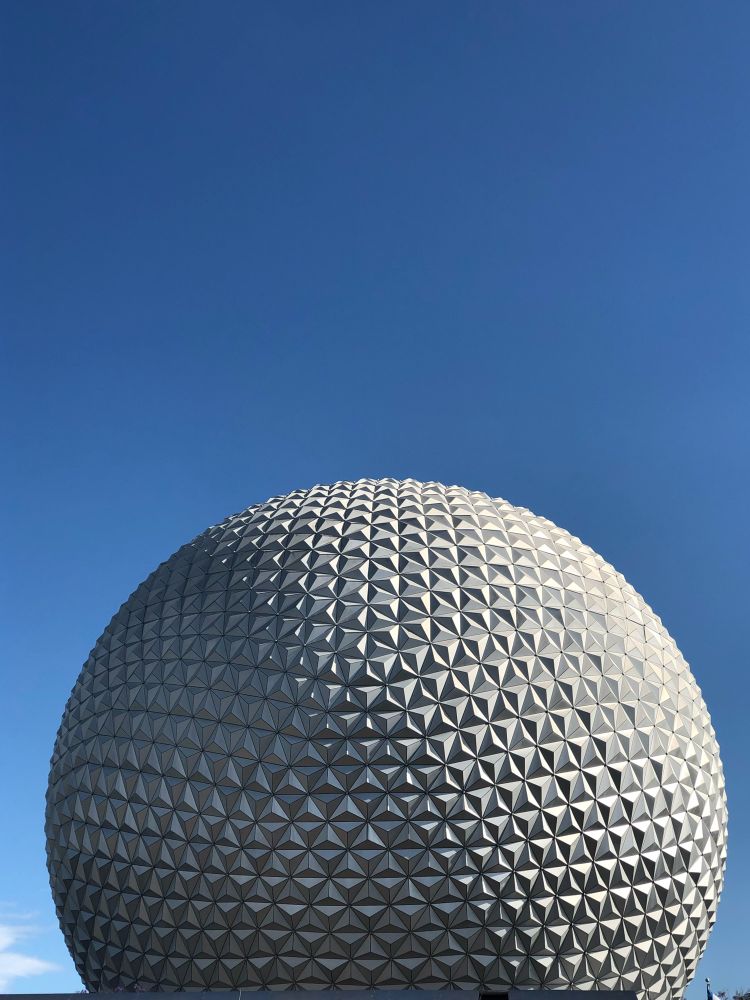 A picture of Spaceship Earth at Epcot in Walt Disney World in Florida on a sunny day with blue skies