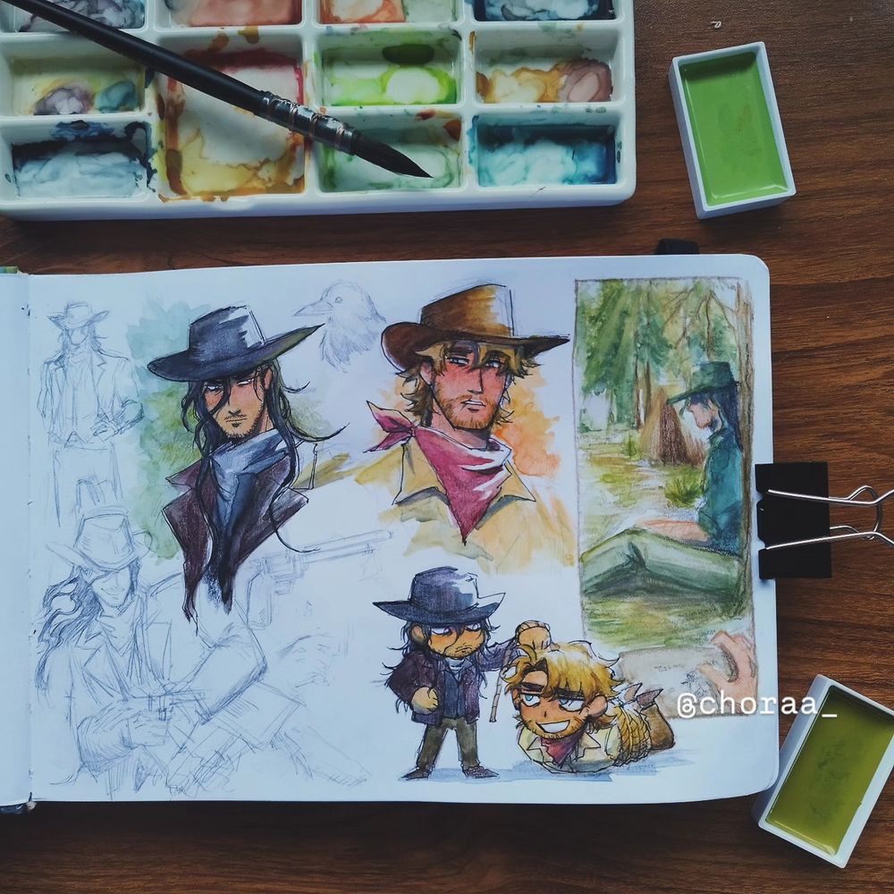 A photo of a sketchbook page, with a used paint palette above it and two paint pans put next to the page. 

Colored headshots of two characters in the middle: Corvus, the one with long messy black hair dressed in darker colors angrily looking to the side in the other character's direction. The other character, Wade, is looking back somewhat warily: blonde man wearing more warmer colors.

Right features a messy sketch panel of Corvus sitting by himself while he is being sketched unknowingly. 

Bottom right are chibi versions of Corvus holding up a hogtied Wade. 

Left are sketches of Cor, one of them has him fanning the gun and smirking.