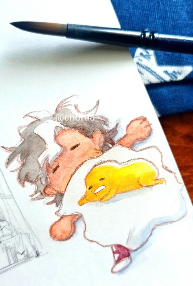 Tiny Dean sleeping with Gudetama on top of him